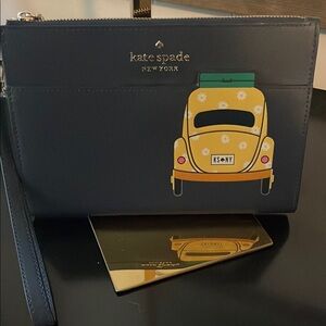 Kate Spade Black Wristlet with Yellow Car Motif